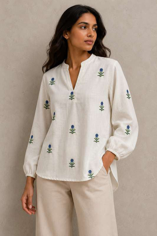 Ivory Blue Floral Embroidered Balloon Sleeve Tunic by SITU, front view on model